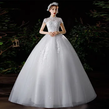 Сватбени рокли Елегантна сватбена рокля с високо воротом и отворен гръб Vestidos De Новия Лесно Финото дантелено сватбена рокля на принцеса